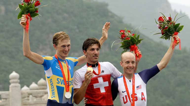 Fabian Cancellara, Schweiz vinner guldet i herrarnas tempolopp före Gustav Larsson (silver) och Levi Leipheimer, USA (brons). Foto: TT
